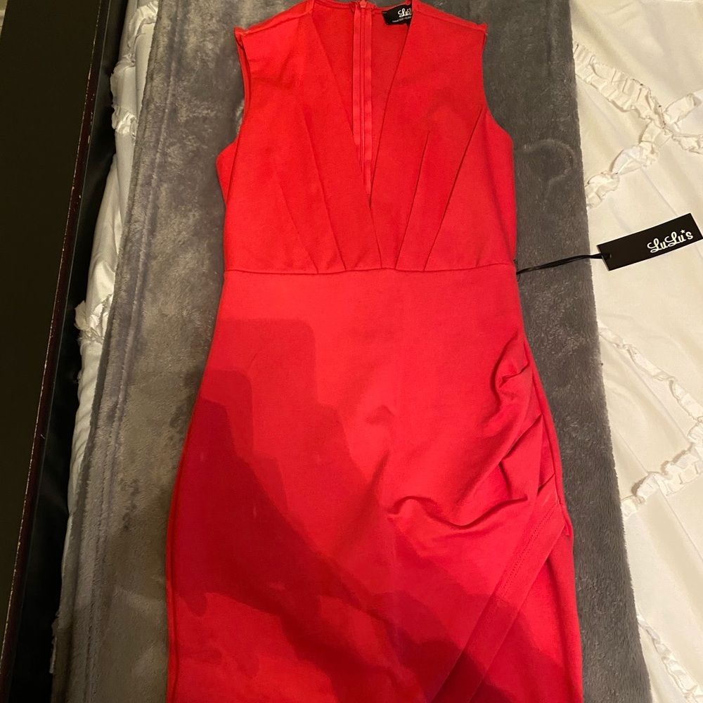 Coral plunging neck line dress